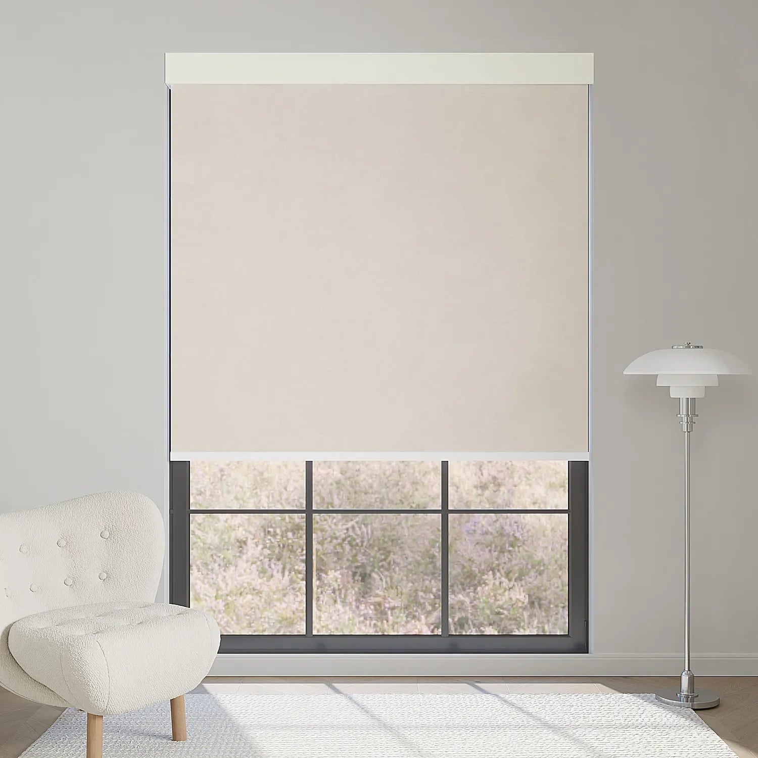 Beige motorized blackout roller shade in fabric series, blocks harsh sunlight while keeping outdoor lavender view visible.