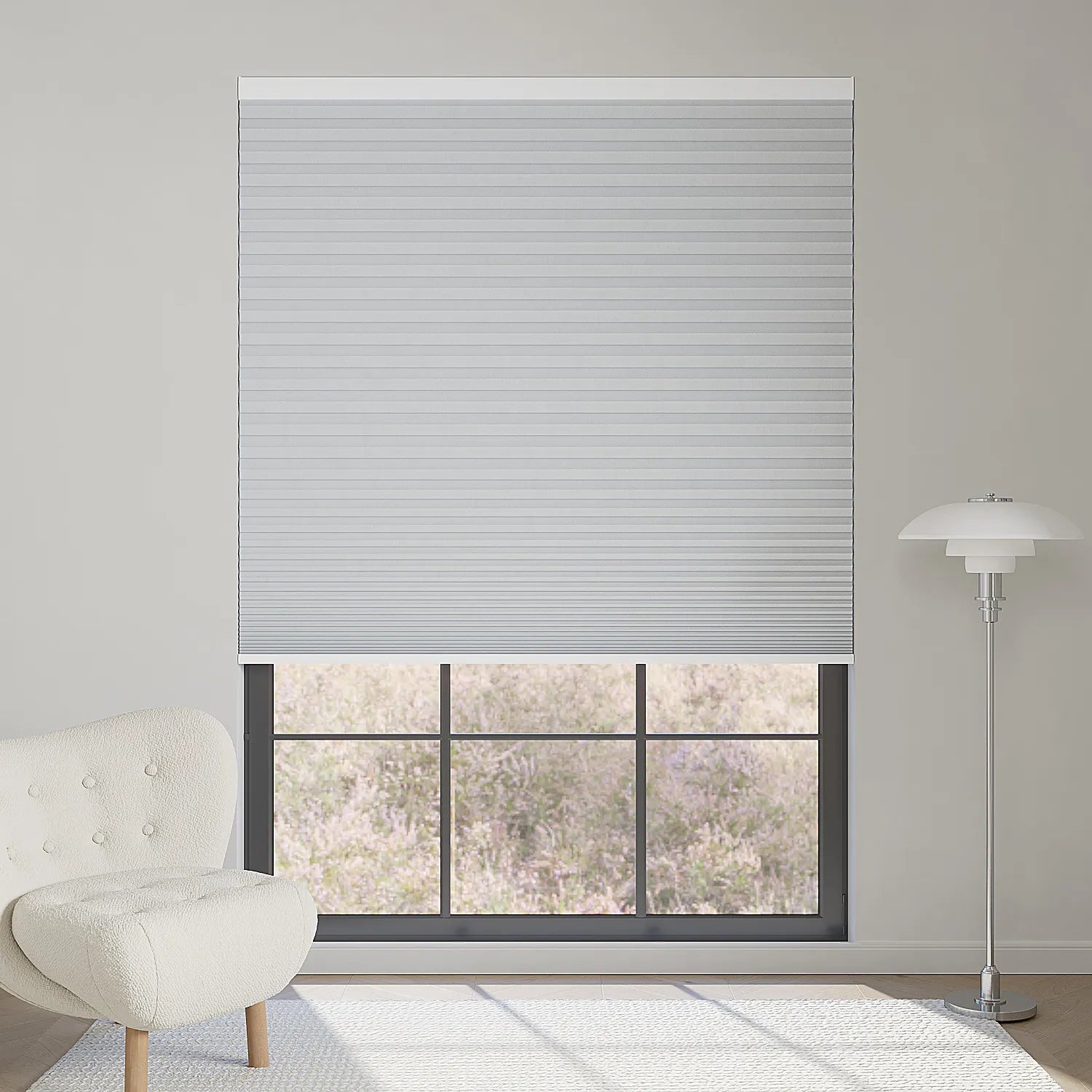 Pearl blackout cellular shades softly block sunlight, giving refined elegance.