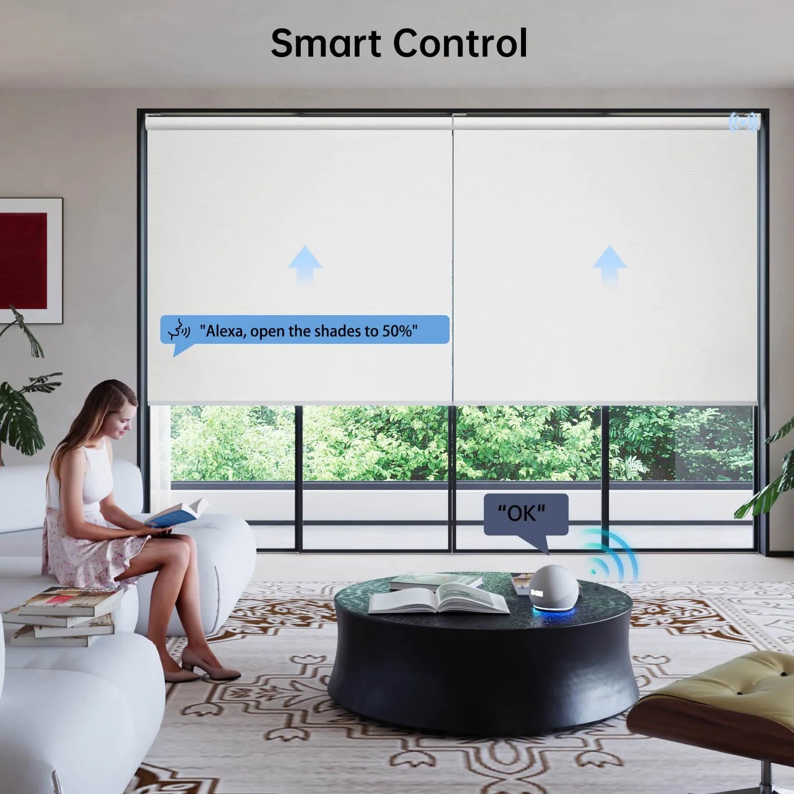"Female homeowner reading at home, using Alexa voice control to adjust the light filtering level of motorized custom roller shades."
