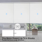 Close-up of the 0.78-inch gap between panels of motorized coupled roller shades, showing seamless installation ideal for large windows.