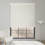Line white motorized blackout roller shade with subtle linear texture, softening sunlight while brightening and modernizing the room.