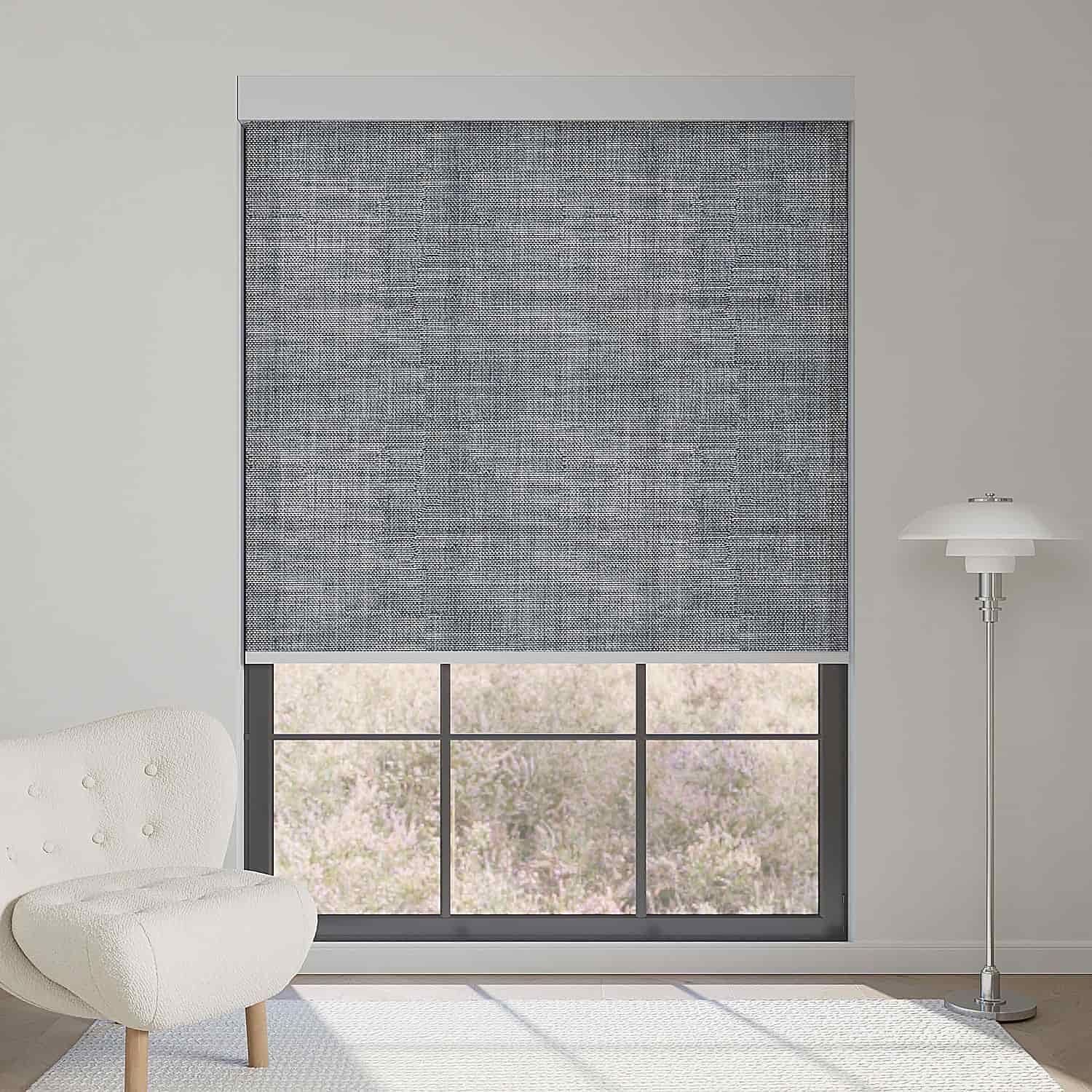 Fabric smoky gray textured light filtering roller shade softens sunlight while adding modern, refined textured depth to interiors.