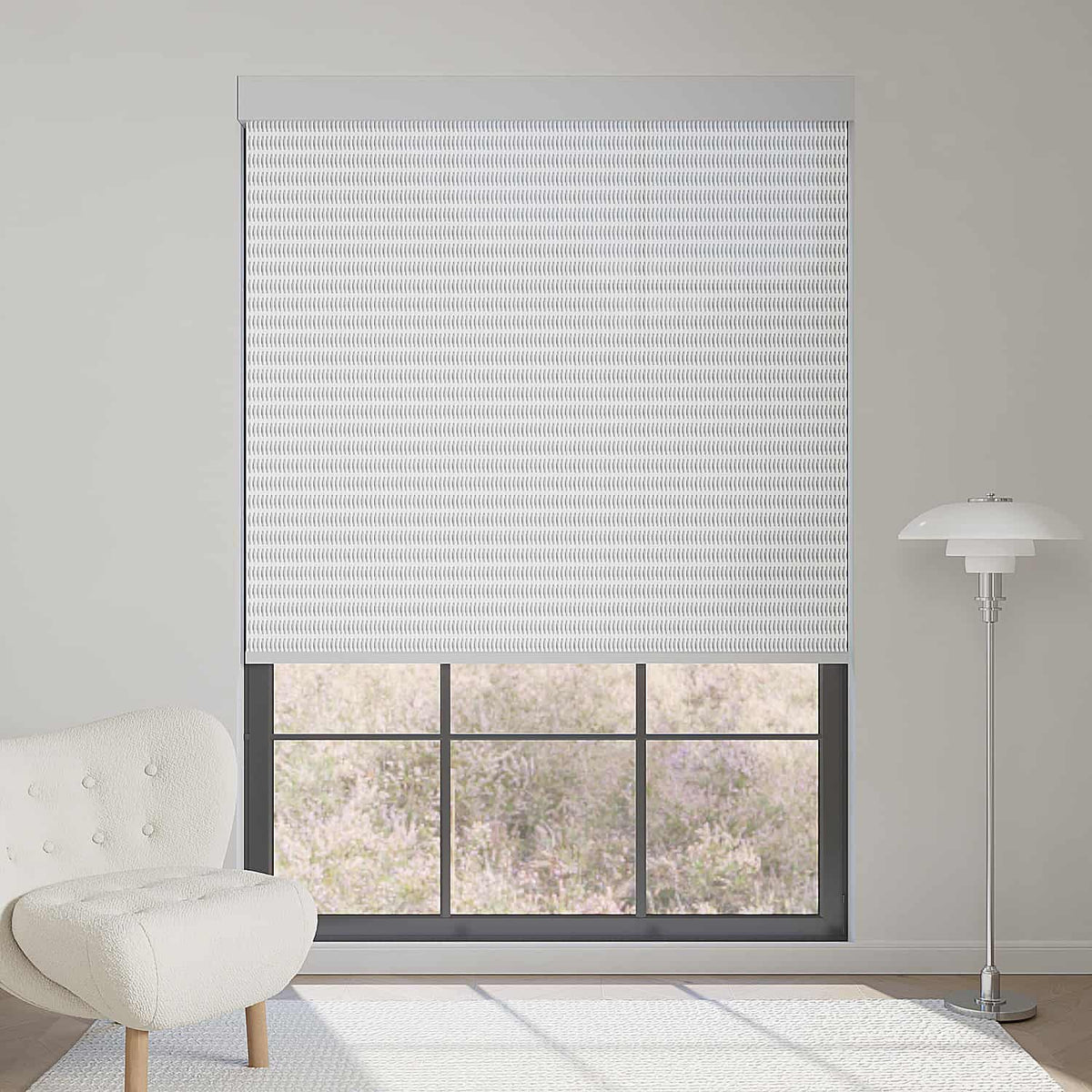 Light gray 1% openness solar shade reduces harsh sunlight, provides privacy, and delivers soft indoor brightness.