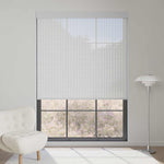 Light gray 3% openness solar shade filters daylight gently, preserving outdoor views and interior privacy.