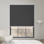 Dark grey motorized blackout roller shade in fabric series, blocks sunlight while keeping a clear lavender garden view.
