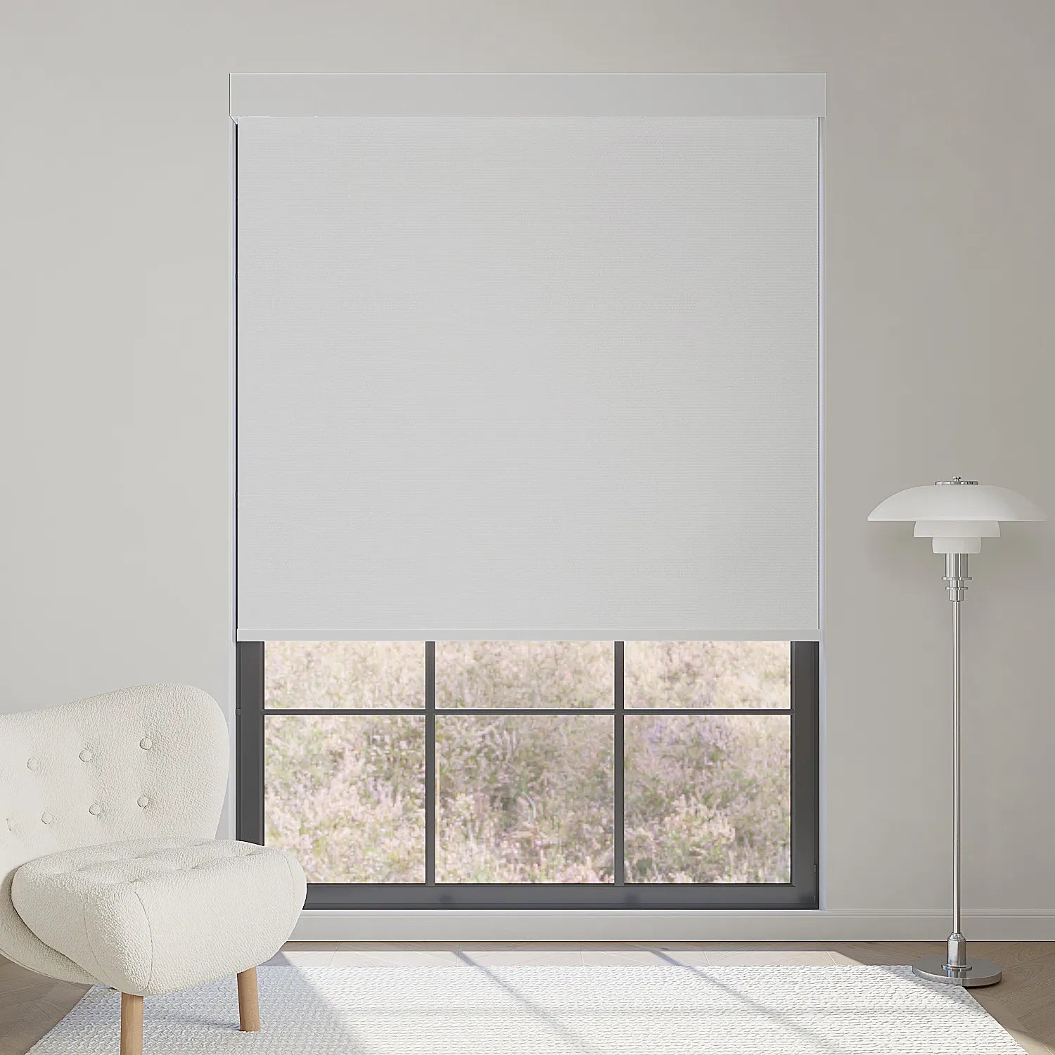 Elegant light grey motorized blackout roller shade softens sunlight while adding modern, calming elegance to interiors.