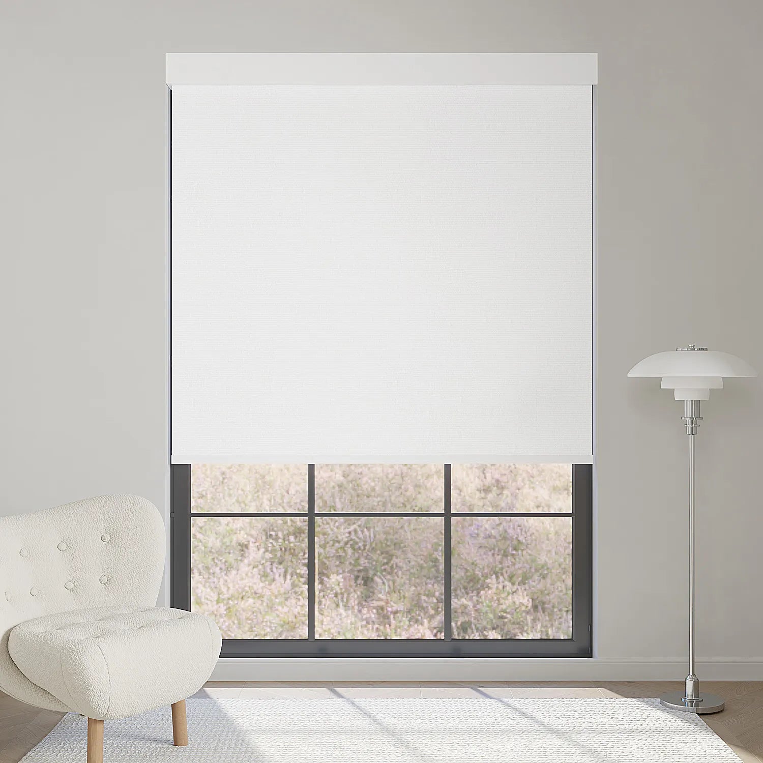 Elegant pure white motorized blackout roller shade, softening sunlight while enhancing a bright, luxurious modern interior.