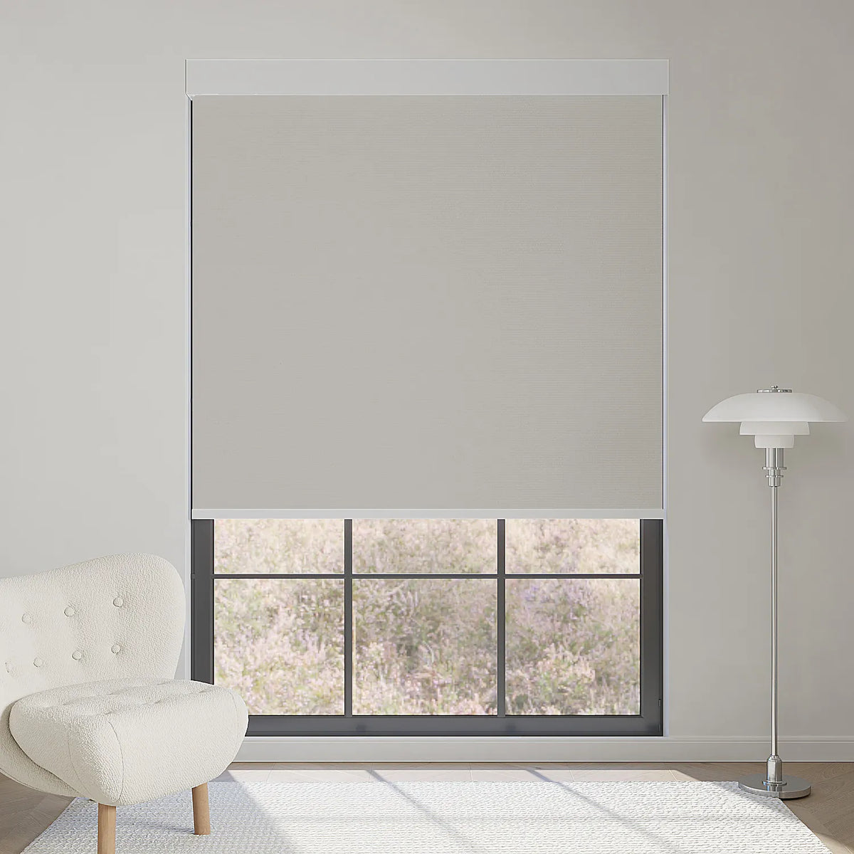 Elegant smoky sea grass motorized blackout roller shade softens sunlight while adding calm, natural elegance to interiors.