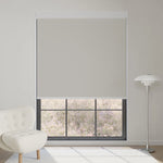 Elegant smoky sea grass motorized blackout roller shade softens sunlight while adding calm, natural elegance to interiors.