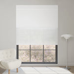 Dual-layer roller shades with blackout and 70% light filtering white fabrics, offering flexible privacy and light control.