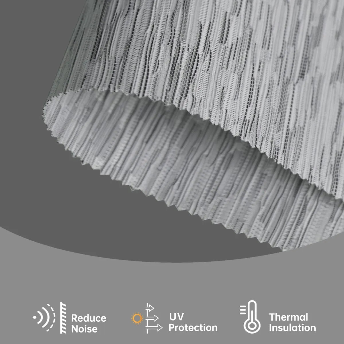 Jacquard grey textured fabric gently filters light, reduces glare, and adds subtle luxurious depth to interiors.