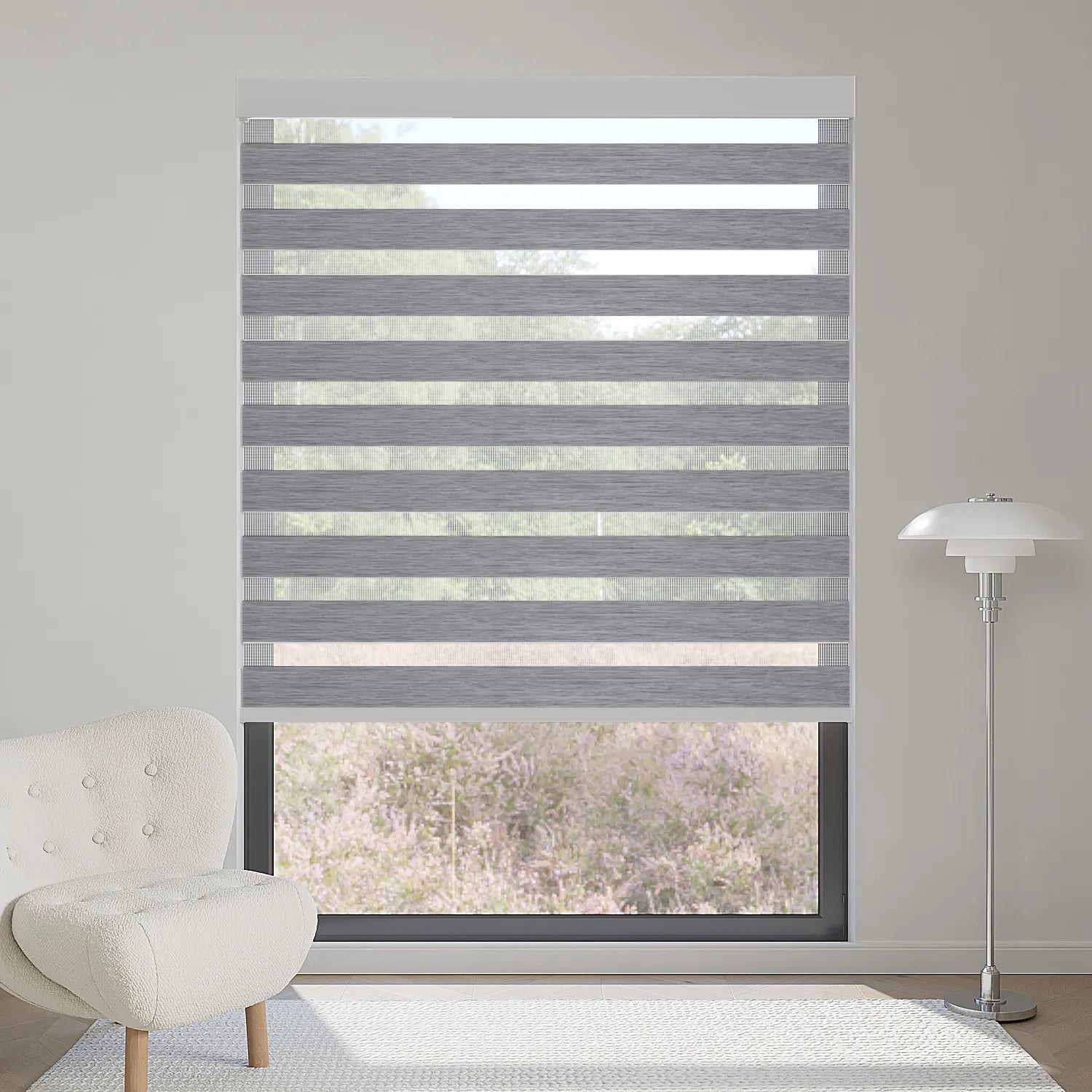 Luxury grey motorized zebra shade blocks 90% sunlight, creating a refined, layered lighting effect indoors.